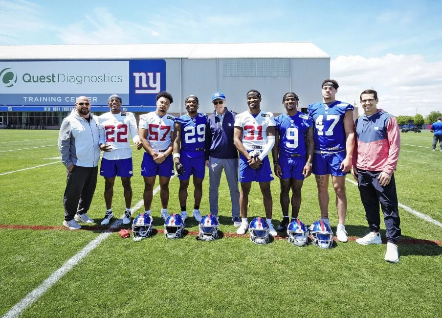 NY Giants' Head Coach Brian Daboll and Owner John Mara with the 2024 Draft Class.